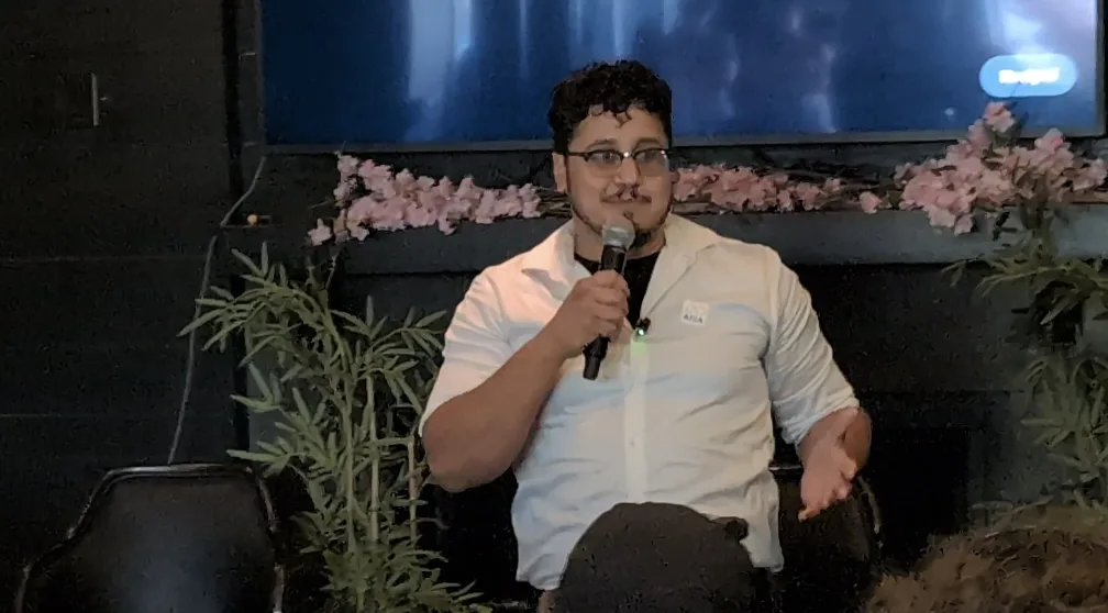 An OpenCLE presenter taking questions from the room