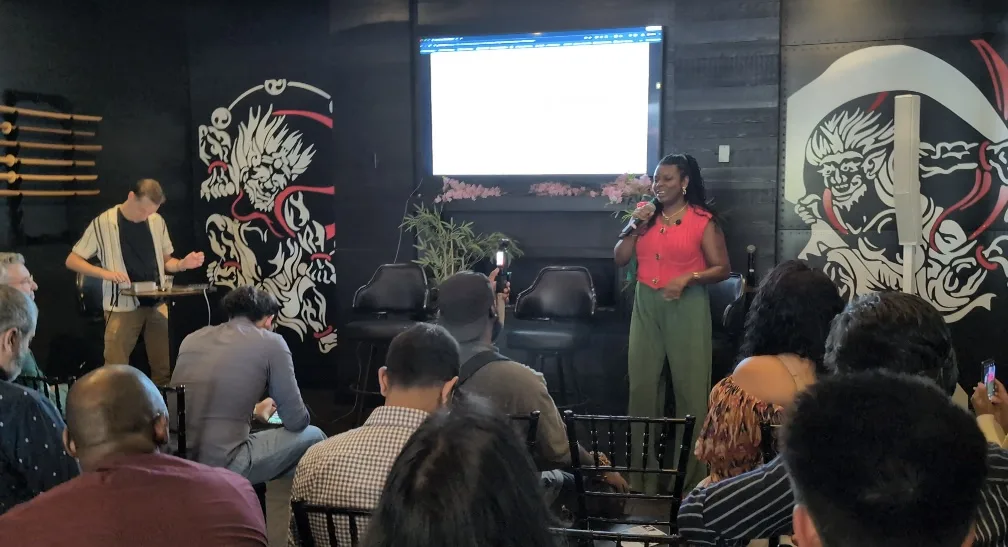 A guest presenting an idea to the OpenCLE audience