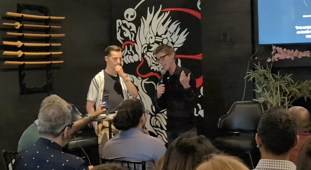 Two OpenCLE speakers in conversation onstage